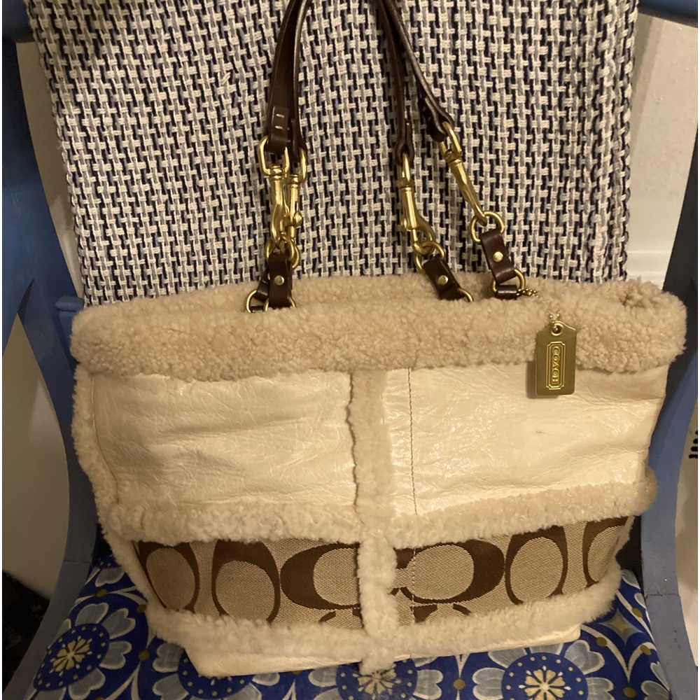 Coach bag cream color with faux fur trim, gently used. Great condition
